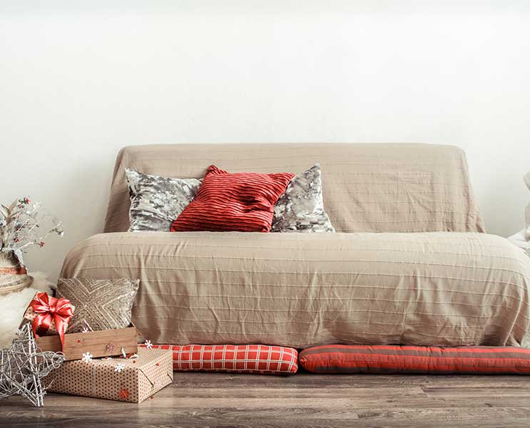 christmas themed sofa with cushions